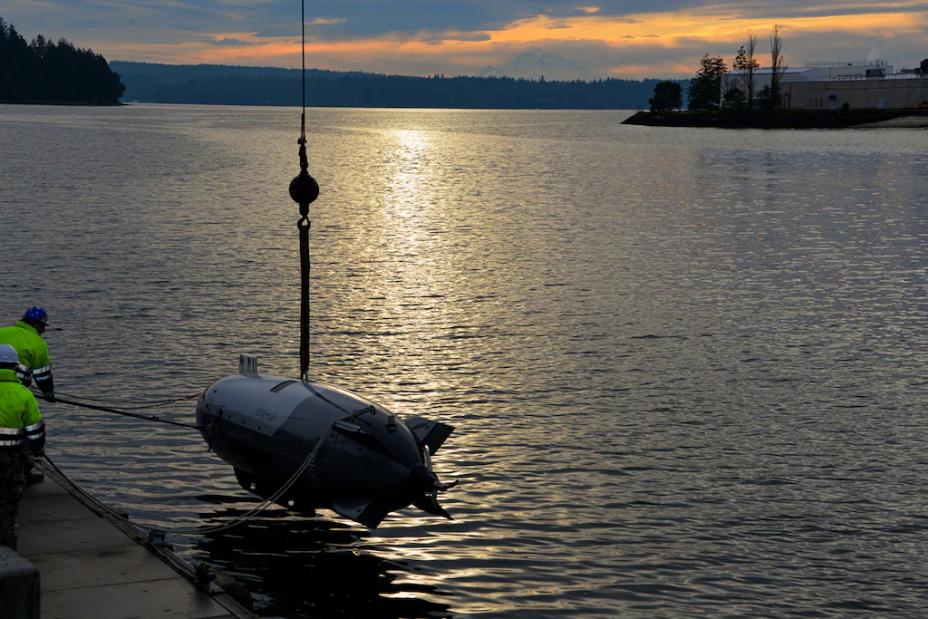 Sailors conduct training with the U.S. Navy’s newest Large Unmanned Undersea Vehicle, the Anduril Dive-LD, in Keyport, Washington, on Dec. 11, 2024. (Loren Nichols/U.S. Navy)