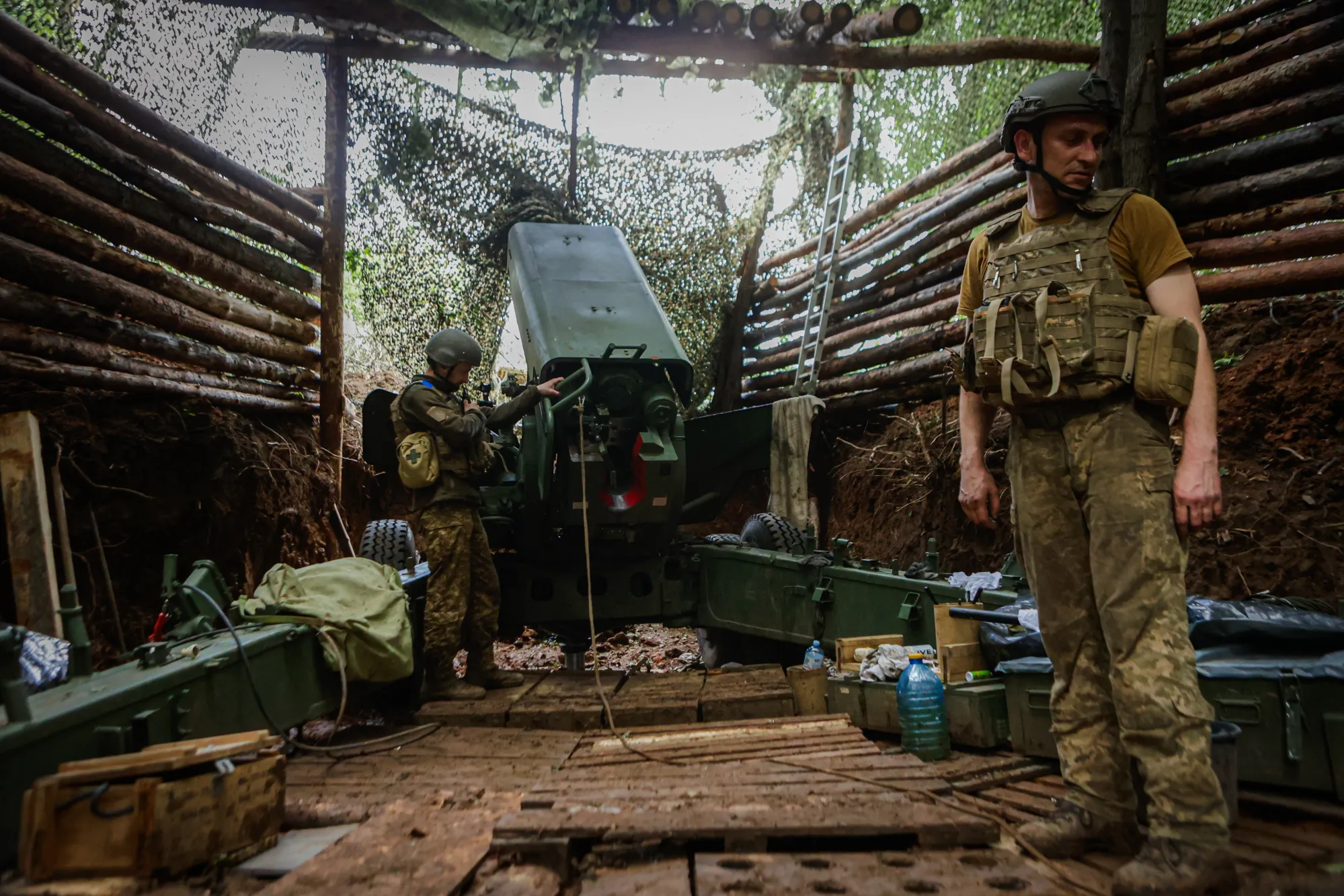 Ukrainian National Guard troops prepare a ‘Bogdana-BG’ artillery installation from a dugout position. (Photo by Sofiia Bobok/Anadolu via Getty Images) Anadolu