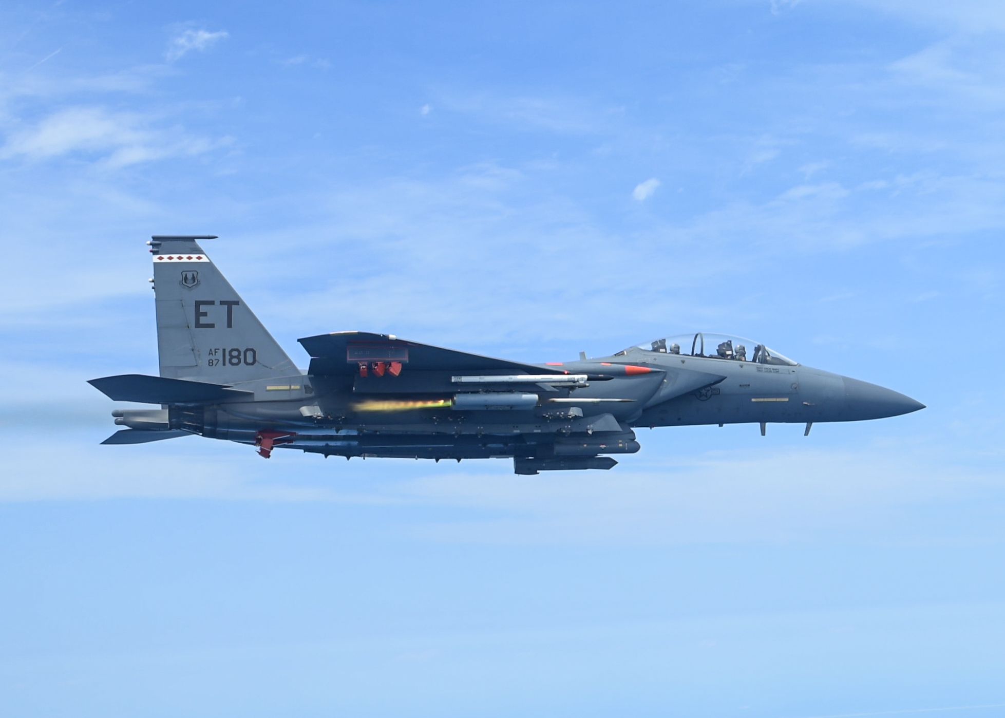 A 96th Test Wing F-15E Strike Eagle flies during a test mission May 22, 2025 over Eglin Air Force Base, Fla., to test AGR-20F APKWS laser-guided rockets on the F-15E. U.S. Air Force photo by Staff Sgt. Thomas Barley